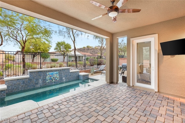 2116 Canvas Edge Dr, Henderson, NV 89044 - view of pool with fence, a ceiling fan, and a patio
