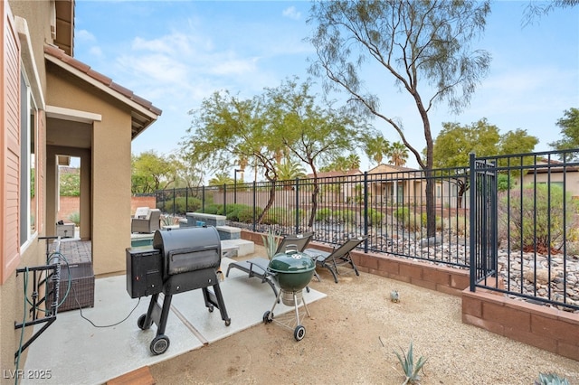 2116 Canvas Edge Dr, Henderson, NV 89044 - view of patio / terrace with an outdoor living space, fence, and grilling area