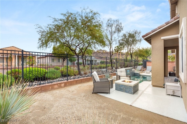 2116 Canvas Edge Dr, Henderson, NV 89044 - view of patio featuring an outdoor fire pit and a fenced backyard