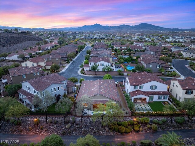 2116 Canvas Edge Dr, Henderson, NV 89044 - aerial view at dusk of a residential view and a mountain view