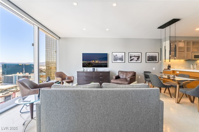 3726 Las Vegas Blvd Unit 2410, Las Vegas, NV 89158 - living room with expansive windows and recessed lighting