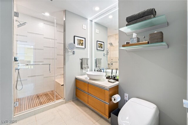 3726 Las Vegas Blvd Unit 2410, Las Vegas, NV 89158 - full bath featuring a stall shower, vanity, and tile patterned flooring