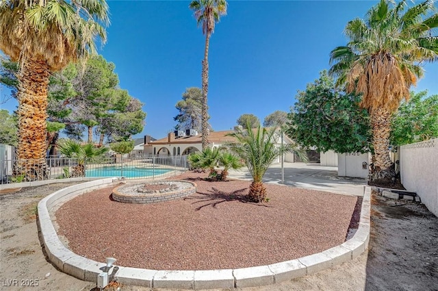 view of pool with fence
