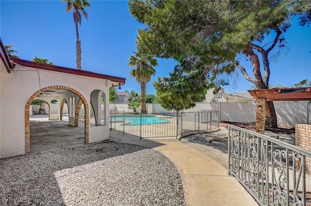 view of pool featuring a patio and a fenced backyard