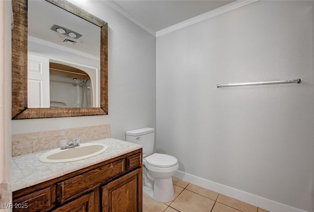 bathroom with crown molding, tile patterned floors, toilet, a shower, and vanity