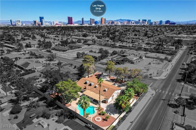aerial view of a view of skyline and a pool area