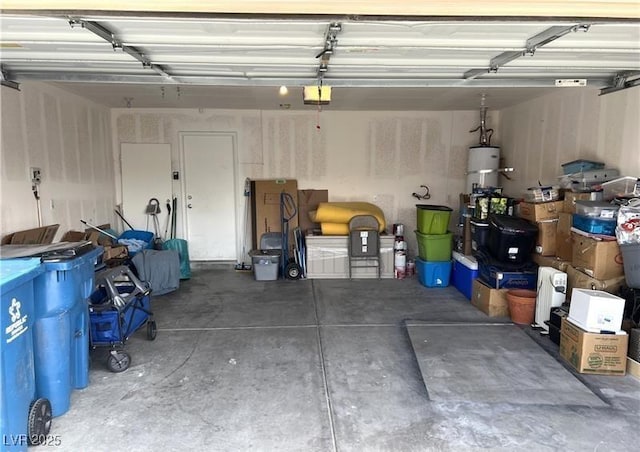 garage with strapped water heater
