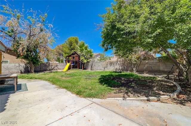 3138 White Rose Way, Henderson, NV 89014 - fenced backyard with a playground and a patio area