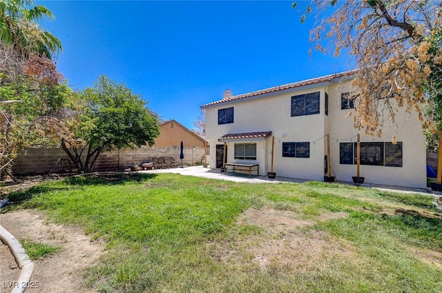 3138 White Rose Way, Henderson, NV 89014 - rear view of house with a patio, a pergola, stucco siding, a fenced backyard, and a tile roof