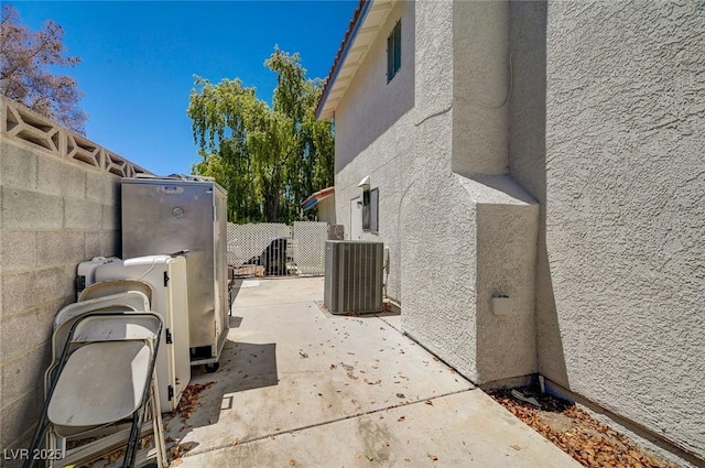 3138 White Rose Way, Henderson, NV 89014 - view of side of property with stucco siding and a patio