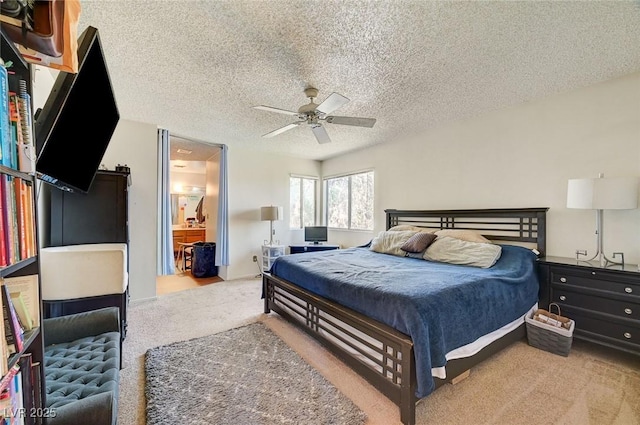 3138 White Rose Way, Henderson, NV 89014 - bedroom with carpet flooring, a textured ceiling, ceiling fan, and ensuite bath