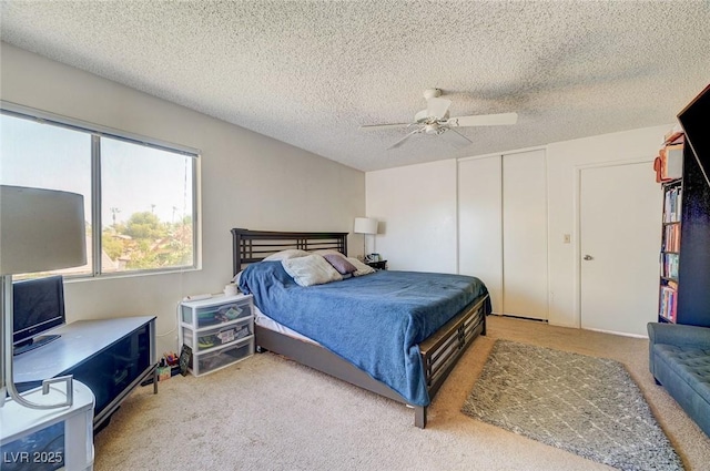 3138 White Rose Way, Henderson, NV 89014 - bedroom featuring carpet floors, a closet, ceiling fan, and a textured ceiling