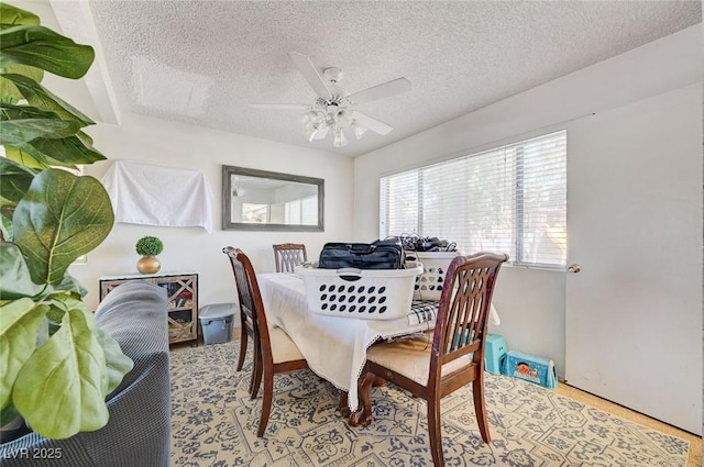 3138 White Rose Way, Henderson, NV 89014 - dining area featuring a textured ceiling and ceiling fan