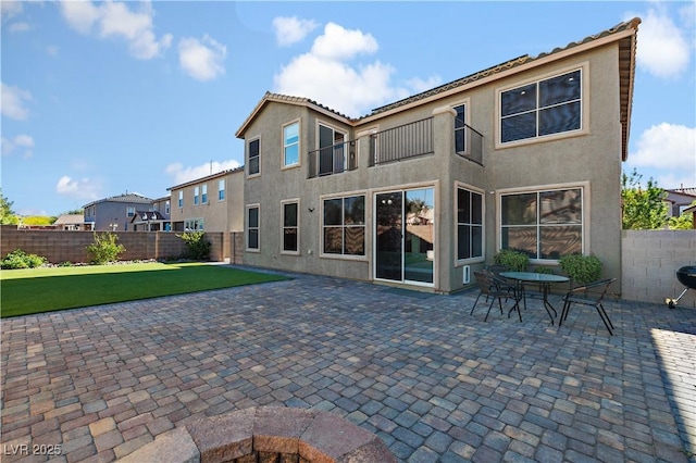258 Chamomile Dr, Henderson, NV 89015 - back of house featuring stucco siding and a patio
