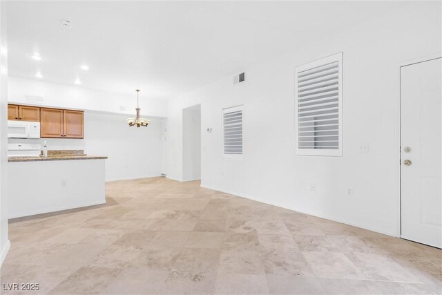2615 W Gary Ave Unit 1041, Las Vegas, NV 89123 - unfurnished living room with a chandelier