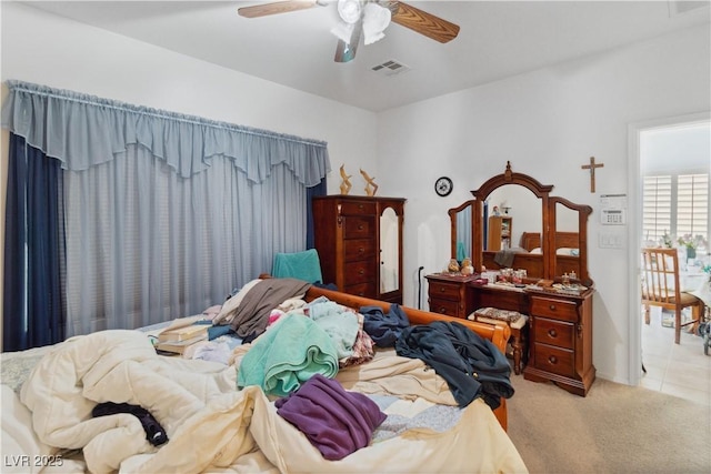 bedroom with carpet flooring and a ceiling fan