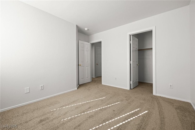 2333 Silver Crew Pass, Henderson, NV 89052 - unfurnished bedroom featuring carpet, baseboards, and a walk in closet