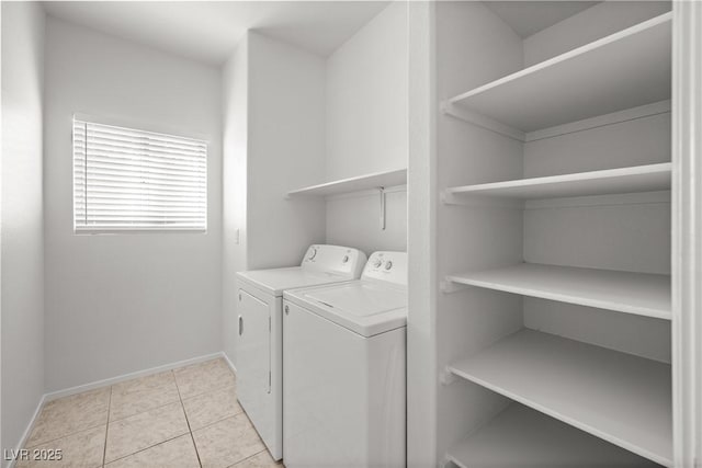 2333 Silver Crew Pass, Henderson, NV 89052 - clothes washing area featuring washing machine and clothes dryer, baseboards, and light tile patterned flooring