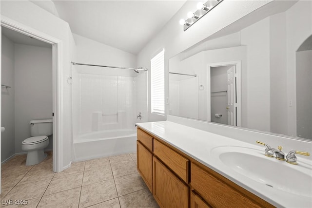 2333 Silver Crew Pass, Henderson, NV 89052 - full bathroom featuring lofted ceiling, toilet, vanity, tile patterned floors, and bathing tub / shower combination