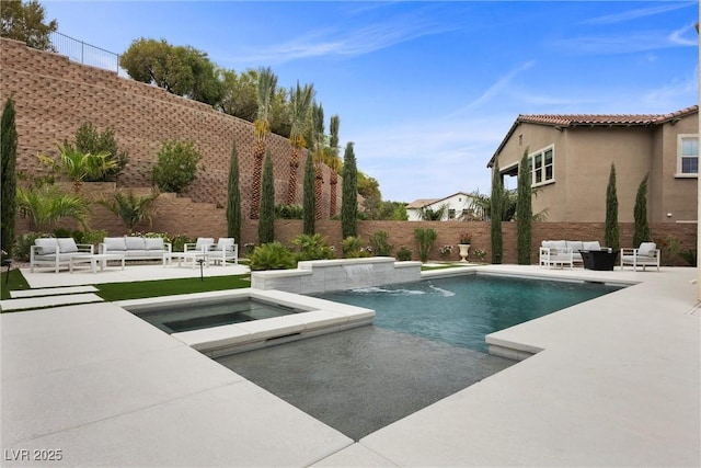4220 San Alivia Ct, Las Vegas, NV 89141 - view of swimming pool featuring outdoor lounge area, a patio area, a fenced backyard, and a pool with connected hot tub