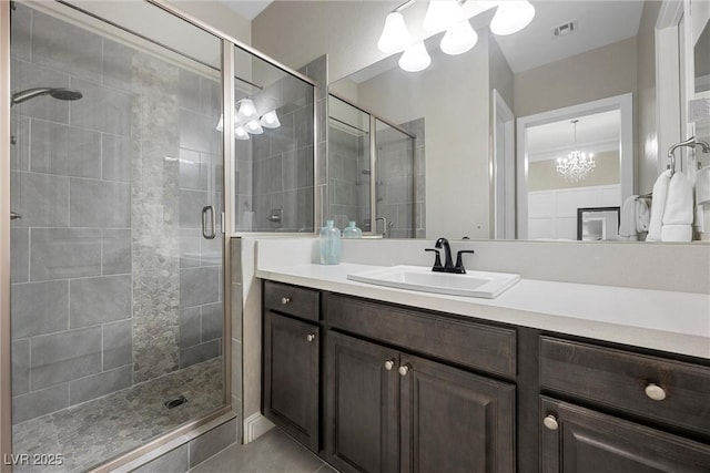 4220 San Alivia Ct, Las Vegas, NV 89141 - full bathroom with a chandelier, a shower stall, and vanity