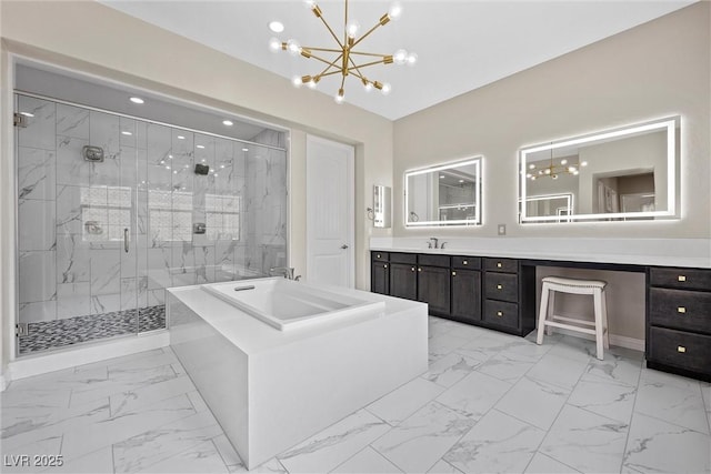 4220 San Alivia Ct, Las Vegas, NV 89141 - full bathroom featuring marble finish flooring, a marble finish shower, a chandelier, a garden tub, and vanity