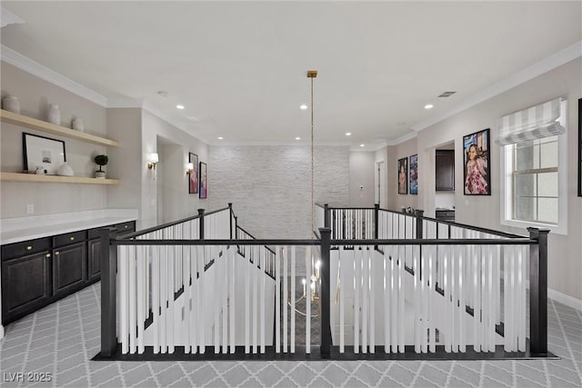 4220 San Alivia Ct, Las Vegas, NV 89141 - hallway featuring an upstairs landing, recessed lighting, crown molding, baseboards, and a chandelier