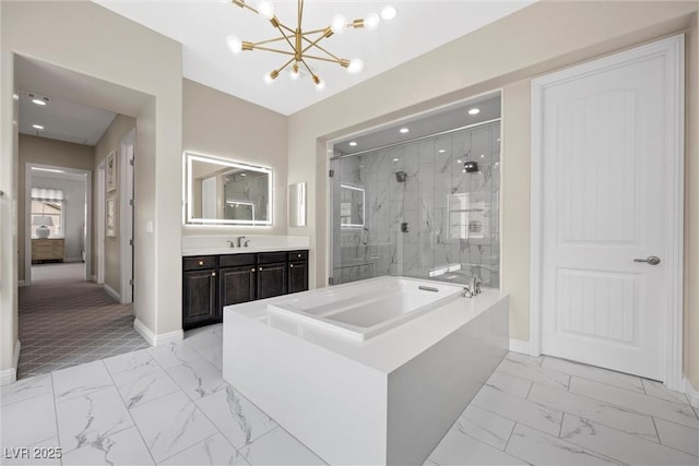4220 San Alivia Ct, Las Vegas, NV 89141 - bathroom with marble look tiles, baseboards, a chandelier, and recessed lighting