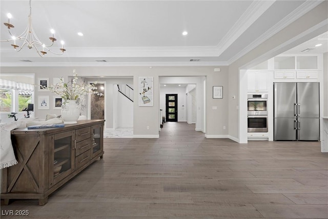 4220 San Alivia Ct, Las Vegas, NV 89141 - living area featuring a chandelier, wood finished floors, ornamental molding, recessed lighting, and baseboards
