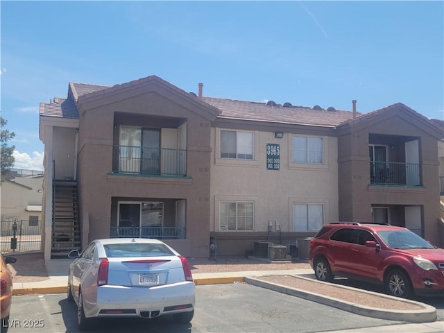 3965 Rebecca Raiter Ave Unit 201, Las Vegas, NV 89110 - view of building exterior with uncovered parking
