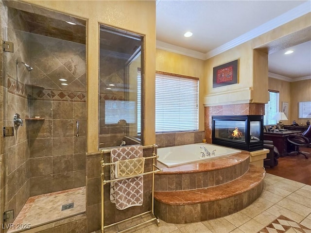 5445 Pendini Point Ct, Las Vegas, NV 89141 - full bath featuring a tiled fireplace, a stall shower, a bath, tile patterned floors, and crown molding