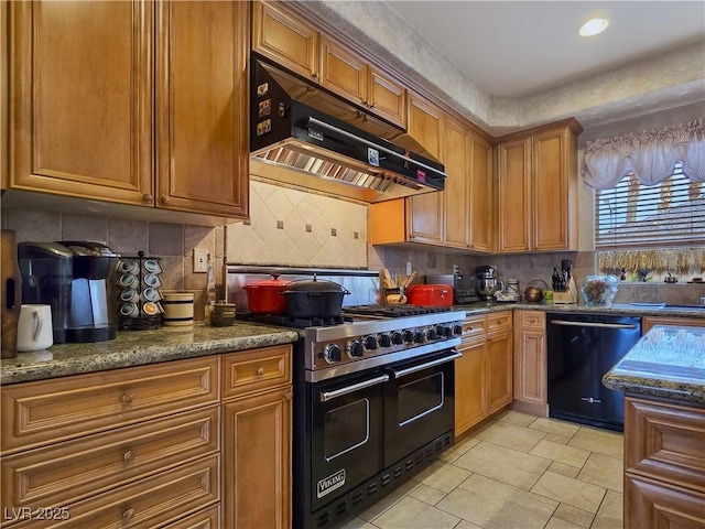 5445 Pendini Point Ct, Las Vegas, NV 89141 - kitchen with black appliances, under cabinet range hood, backsplash, dark stone countertops, and recessed lighting