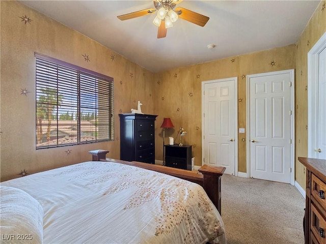 5445 Pendini Point Ct, Las Vegas, NV 89141 - carpeted bedroom with ceiling fan and baseboards