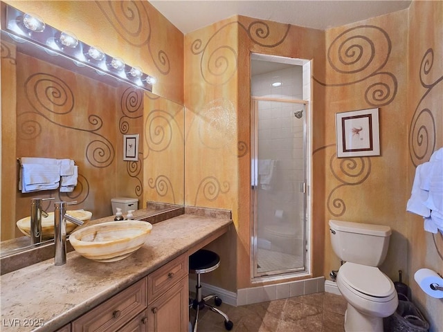 5445 Pendini Point Ct, Las Vegas, NV 89141 - full bathroom featuring toilet, a shower stall, vanity, and baseboards