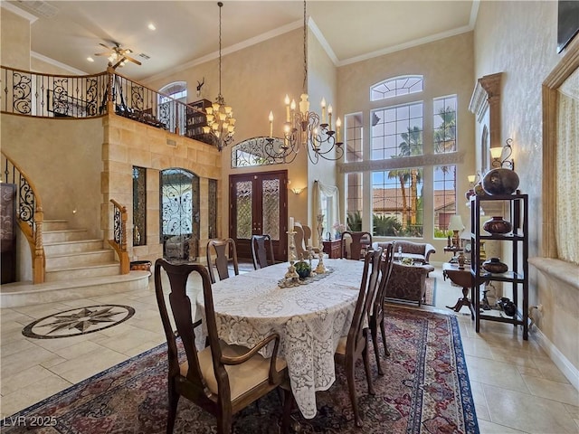 5445 Pendini Point Ct, Las Vegas, NV 89141 - dining room featuring french doors, healthy amount of natural light, stairway, a chandelier, and ornamental molding