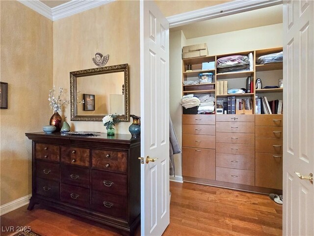 5445 Pendini Point Ct, Las Vegas, NV 89141 - interior space with light wood-type flooring, crown molding, and baseboards