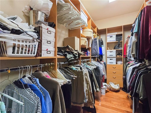 5445 Pendini Point Ct, Las Vegas, NV 89141 - spacious closet featuring wood finished floors