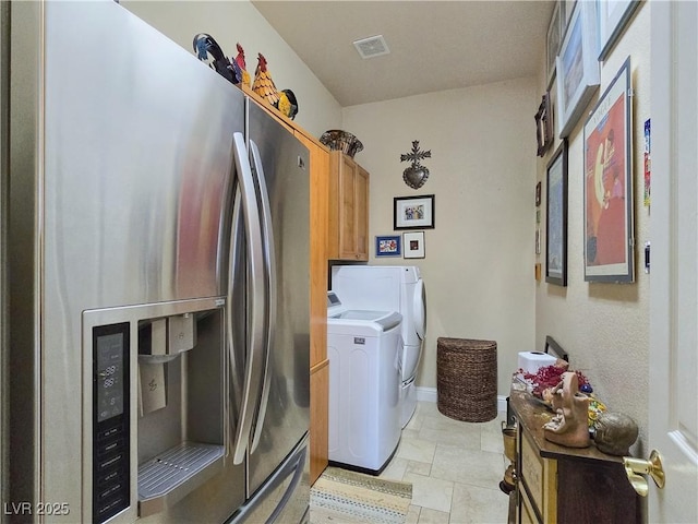 5445 Pendini Point Ct, Las Vegas, NV 89141 - laundry area featuring washer and clothes dryer, cabinet space, and baseboards