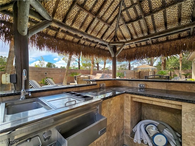5445 Pendini Point Ct, Las Vegas, NV 89141 - view of patio / terrace featuring a gazebo, fence, and exterior kitchen