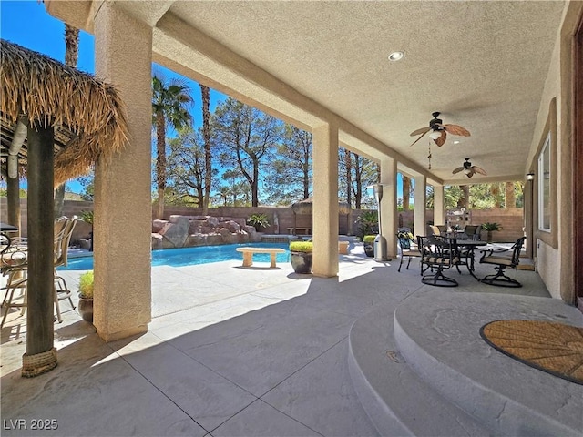 5445 Pendini Point Ct, Las Vegas, NV 89141 - view of patio / terrace with a fenced backyard, ceiling fan, and outdoor dining area