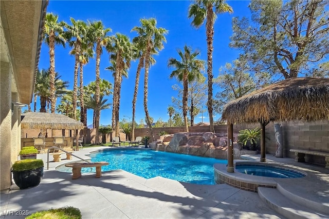 5445 Pendini Point Ct, Las Vegas, NV 89141 - view of pool featuring a fenced backyard, a patio area, and a pool with connected hot tub
