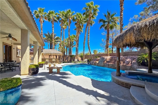 5445 Pendini Point Ct, Las Vegas, NV 89141 - view of swimming pool featuring a patio area, a fenced backyard, ceiling fan, and a pool with connected hot tub