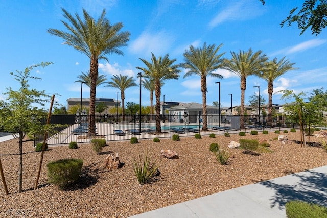 3709 Neblina Dr, Henderson, NV 89052 - view of playground featuring fence and a community pool