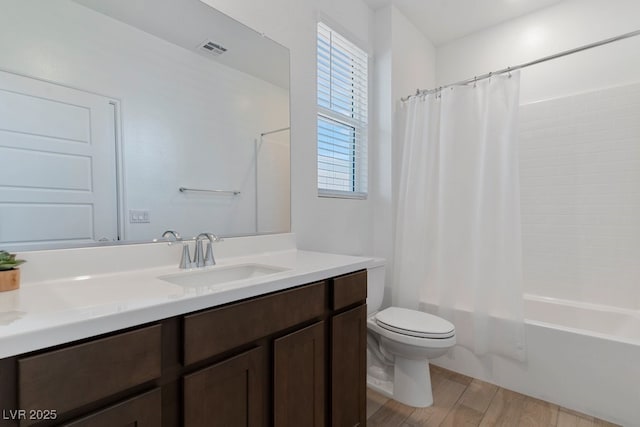 3709 Neblina Dr, Henderson, NV 89052 - full bathroom with toilet, wood finished floors, vanity, and shower / bath combo