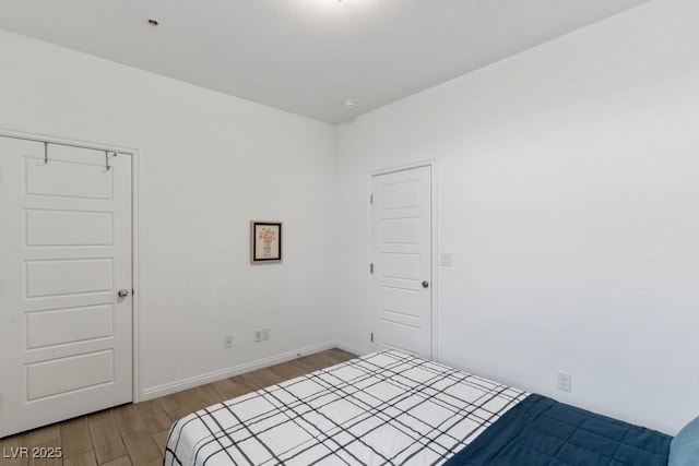 3709 Neblina Dr, Henderson, NV 89052 - unfurnished bedroom featuring light wood-type flooring and baseboards