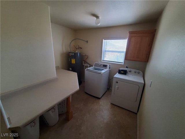 5272 Truman Ln, Caliente, NV 89008 - laundry room with water heater, washing machine and clothes dryer, and cabinet space