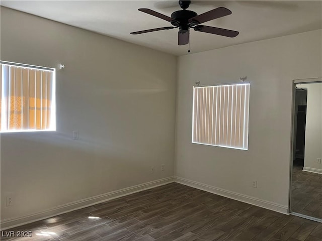 5170 S Jones Blvd Unit 108, Las Vegas, NV 89118 - unfurnished room featuring dark wood-type flooring, a ceiling fan, and baseboards