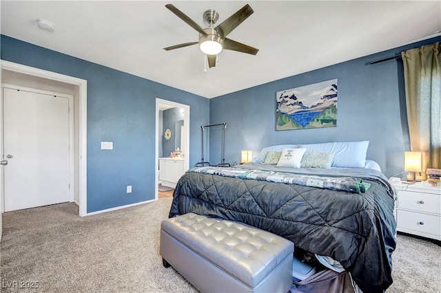 9065 Adorable Ave, Las Vegas, NV 89149 - carpeted bedroom with baseboards, ensuite bath, and a ceiling fan