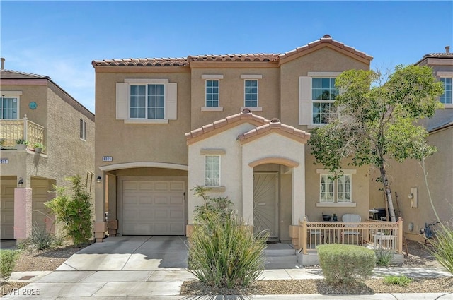 9065 Adorable Ave, Las Vegas, NV 89149 - view of front of home with a tiled roof, stucco siding, and concrete driveway