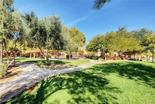 9065 Adorable Ave, Las Vegas, NV 89149 - surrounding community with a yard